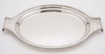 A George V silver serving tray, maker Roberts & Belk, Sheffield, 1930: of oval outline,