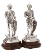 A pair of German silver figures of knights in armour, bears import marks for Adolph Barsach Davis,