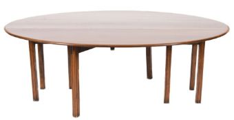 A mahogany 'Wake' table in the George III manner:,