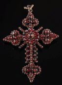 A silver and Bohemian garnet pendant 'cross': 87mm long including suspension loop.