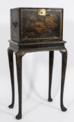 An 18th Century Anglo-Indian and chinoiserie decorated cabinet on stand:,