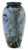 A Moorcroft pottery vase: of oviform tube lined in the Butterfield pattern after the original by