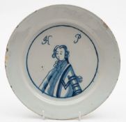 A Bristol blue and white delftware 'King of Prussia' plate: painted with a half length portrait of