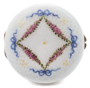 A Continental silver and enamelled box: of circular form,
