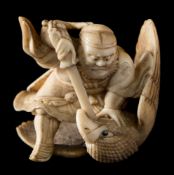 A Japanese carved ivory okimono,