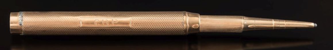 A 9ct gold sleeved propelling pencil:.