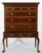 A 19th Century mahogany, satinwood crossbanded and inlaid chest on stand:,