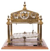 Congreve rolling ball clock: a brass reproduction of a rolling ball clock as first devised by