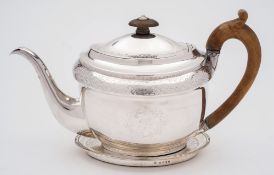 A George III silver teapot and matching stand, maker John Emes, London, 1802: initialled,