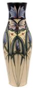 A Moorcroft pottery vase: of slender oviform tubelined in the Sweet Harmony pattern after an