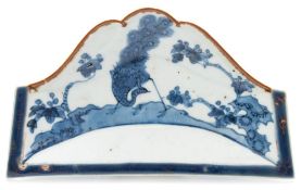 An unusual Japanese Arita blue and white dish: of angular form with one arched serpentine side,