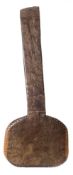 A carved hardwood Polynesian paddle: the rectangular shaped blade with chip carved border,