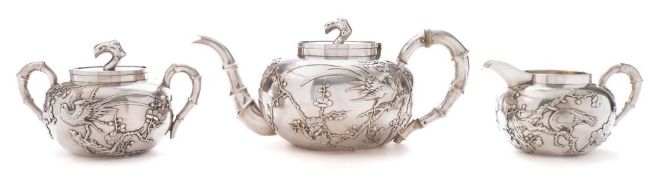 A Chinese silver three piece tea service.