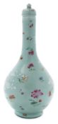 A Chinese celadon glazed bottle vase and cover: decorated in white with pierced rocks and