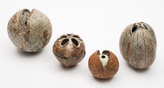 Alan Wallwork (born 1931) four stoneware vessels: two of split spherical form under buff glazes and