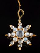 A graduated moonstone 'star' pendant/brooch: the central moonstone 8.