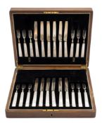 A set of George V silver and mother of pearl fruit knives and forks, maker W & G, Sheffield, 1926:,