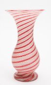A latticino glass vase: of ribbed baluster form,