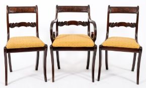 A set of eight Regency mahogany dining chairs:,