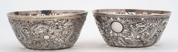 A pair of Chinese silver dishes, maker Hung Chong,