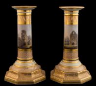 A pair of Barr Flight & Barr [Worcester] 'Music' candlesticks: of pillar form on octagonal bases,