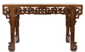 A Chinese carved wood altar table:, of large size, with a rectangular top,