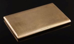 A 9ct gold engine turned rectangular cigarette case:, 184gms gross weight.