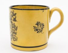 A Staffordshire canary yellow-ground pottery 'Porter' mug: of cylindrical form with leaf-capped