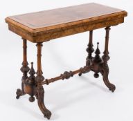 A Victorian burr walnut and inlaid rectangular card table:, bordered with boxwood and ebony lines,