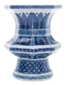 An unusual Chinese porcelain stand: of octagonal baluster form with quadrilobed opening,
