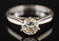 A diamond single-stone ring: the circular brilliant-cut stone approximately 5.