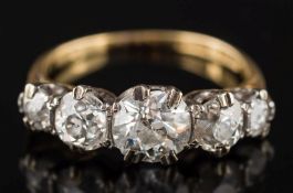 A graduated diamond five-stone ring: with old-cut diamonds, the principal diamond approximately 6.