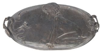 A WMF art nouveau oval pewter two-handled dish: embossed with a kneeling child gazing at a snail