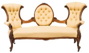 A Victorian carved rosewood chair back settee:,