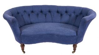 An Edwardian walnut frame curved settee:,