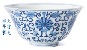 A Chinese blue and white 'lotus' bowl: with flared rim and short footrim,