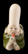 A Japanese carved, inlaid and stained ivory netsuke, signed Hosei: of Fukurokuju,
