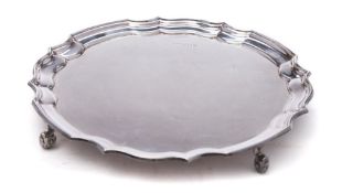 An Elizabeth II silver waiter, maker Roberts & Dore, Sheffield, 1976: of plain circular form,