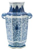 A Chinese blue and white double lozenge-shaped vase: with elephant head handles,