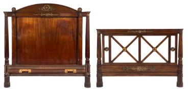 A French Empire mahogany and gilt metal mounted double bed:,