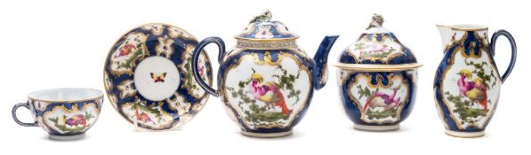 A Samson 'First Period Worcester' part tea service: painted with cartouches of fancy birds and