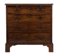 A George III mahogany chest:, of small size, the top with a moulded edge,
