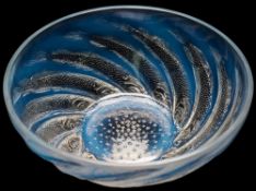 A Lalique bowl 'Poissons': the mildly opalescent bowl of circular form,