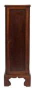 A mahogany pedestal cabinet:, constructed from Georgian timbers, the top with a moulded edge,
