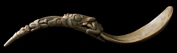 A Northwest Coast Native American carved horn spoon: with pear-shaped bowl,