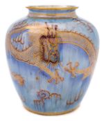 A Wedgwood ordinary lustre vase: of oviform decorated in gold and purple with a pair of dragons