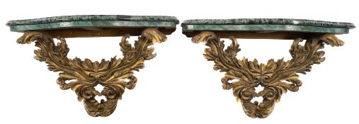 A pair of carved giltwood acanthus scroll decorated console brackets:,