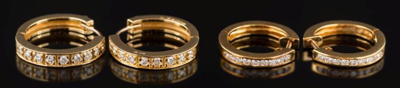A pair of 18ct gold and diamond hoop earrings: pave-set with diamonds estimated to weigh a total of