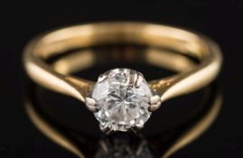 An 18ct gold and diamond solitaire ring: the circular, brilliant-cut diamond 5.