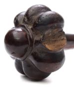 A Fijian throwing club: with lobed tulip shaped head,